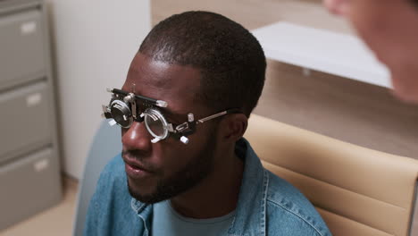 doctor putting lenses on patient