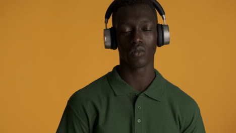 african american man on yellow background.