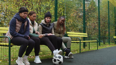 friends in an outdoors soccer field