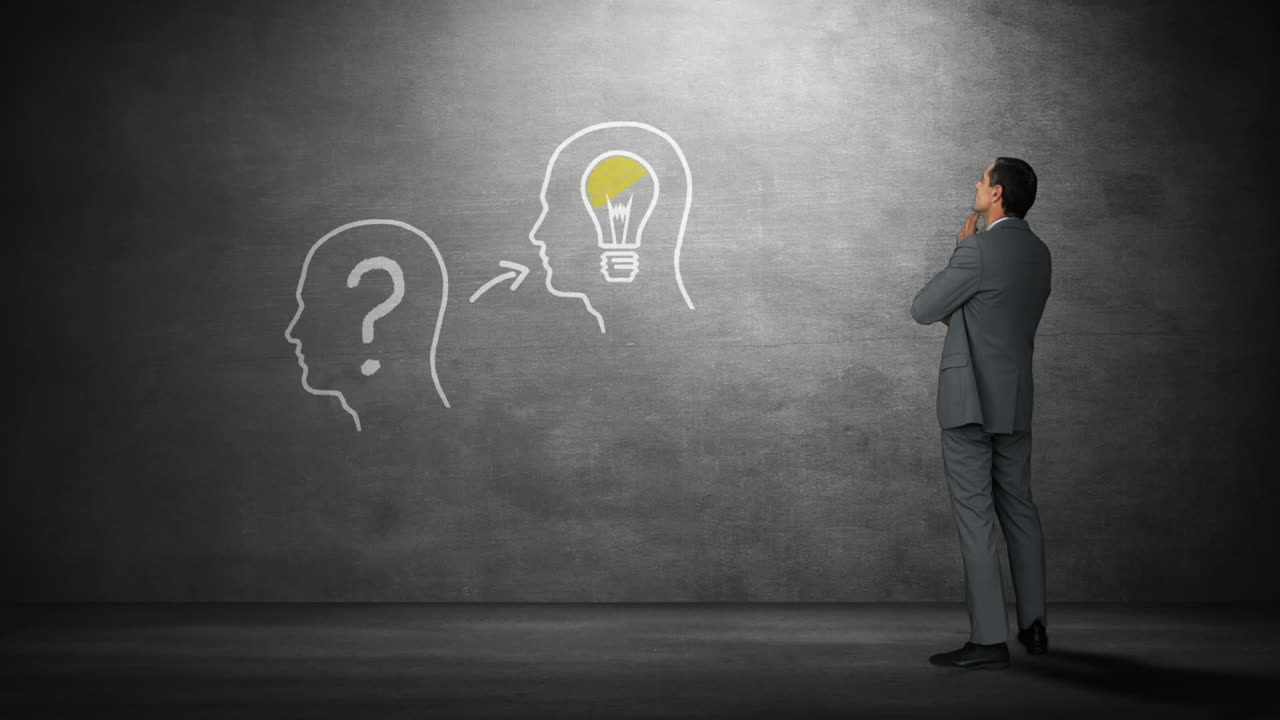 Businessman looking at human heads