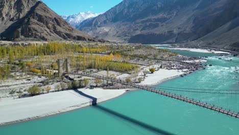 aerial view of a wooden bridge outside skardu, a city in northern pakistan