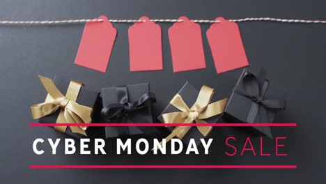 animation of cyber monday sale text over gift tags and boxes