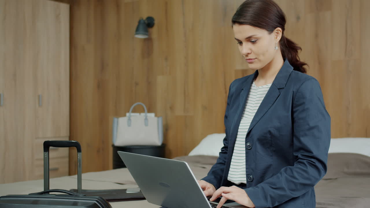 Business Woman Working from Hotel Room