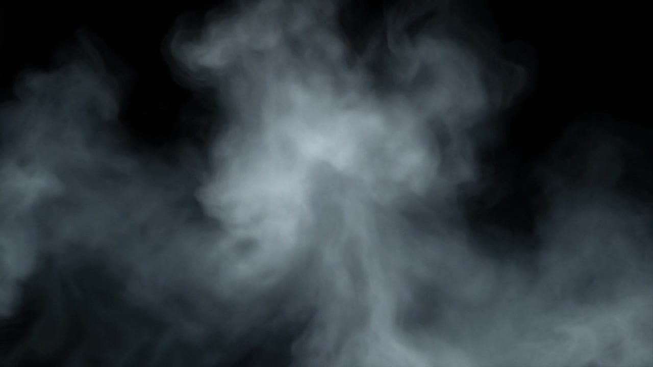 Humo blanco elevándose contra un fondo negro