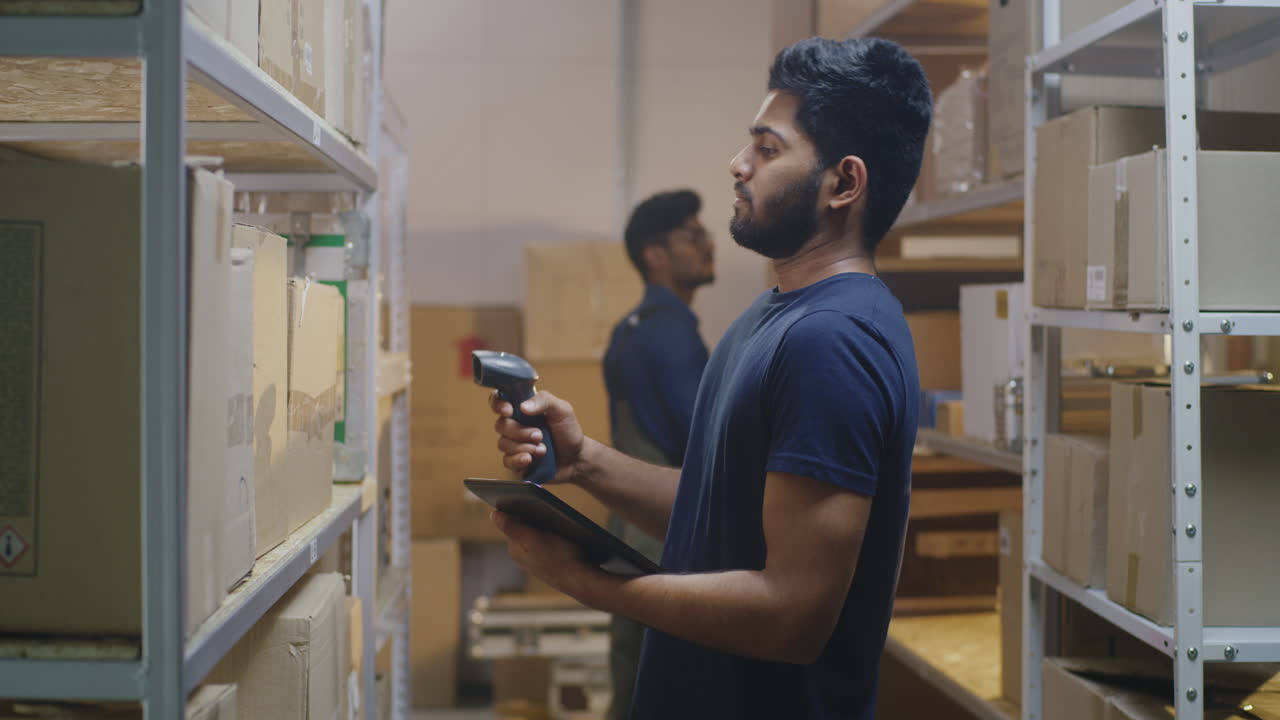 Warehouse Worker Scanning Inventory