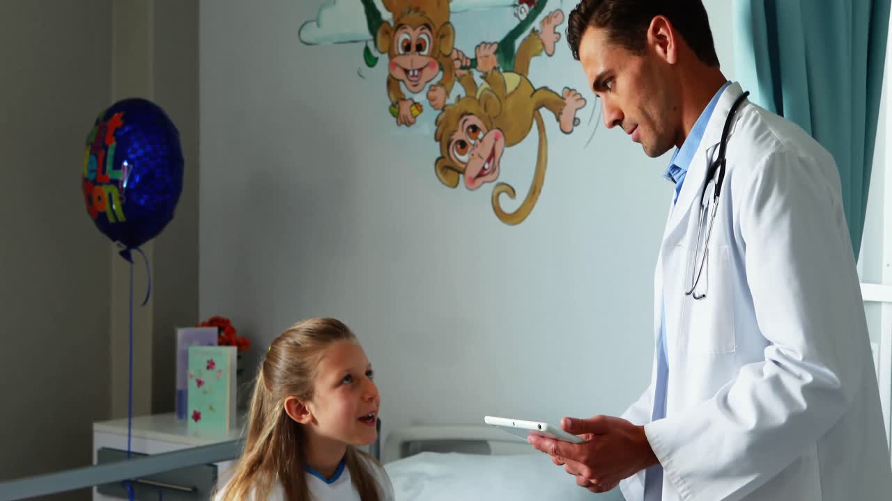 Doctor interacting with a sick girl
