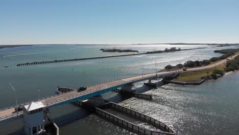 exciting aerial of boca grande bridge and turn to the island of boca grande, florida, united states