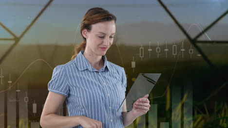 animation of financial data processing over caucasian woman using tablet