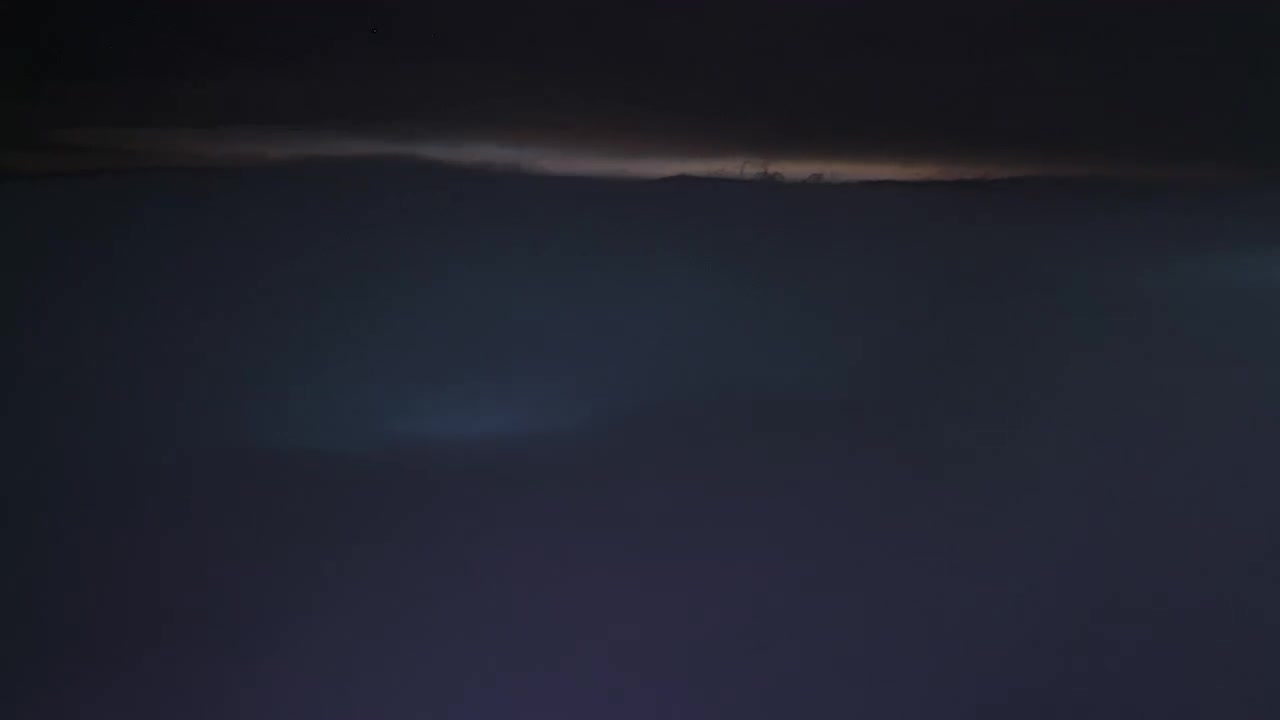 Dark Stormy Clouds Moving Over Night Sky