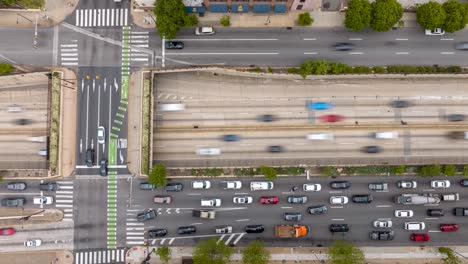 top down aerial hyperlapse of heavy traffic in american city