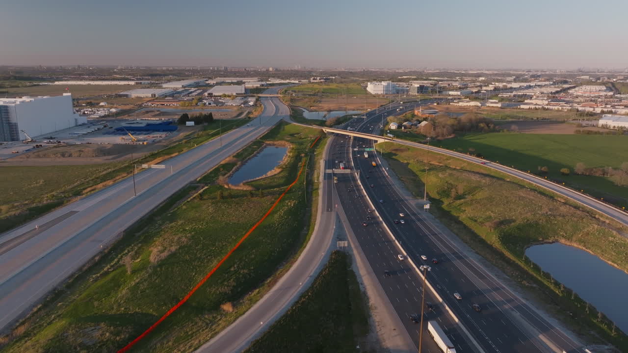 Mississauga's highway 401 with urban and green landscapes, aerial view