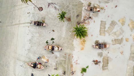 Fishing-Boats-With-Fishnets-Lying-On-The-Sandy-Coast-In-Kuakata-Sea-Beach-In-Bangladesh