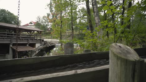 Water-going-through-old-wooden-river-mill