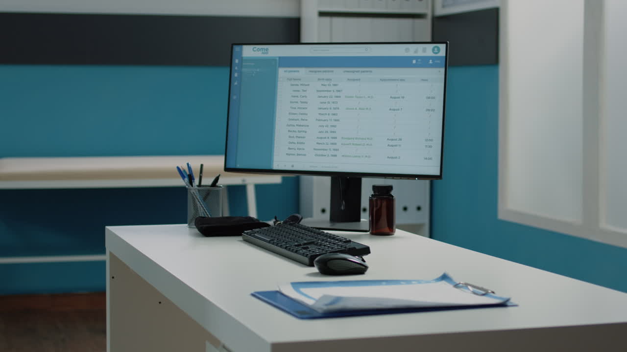 Doctor's office with computer and examination table