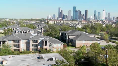 a suburban area of houston with the downtown distant