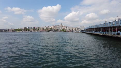 istanbul cityscape with ferry and bridge