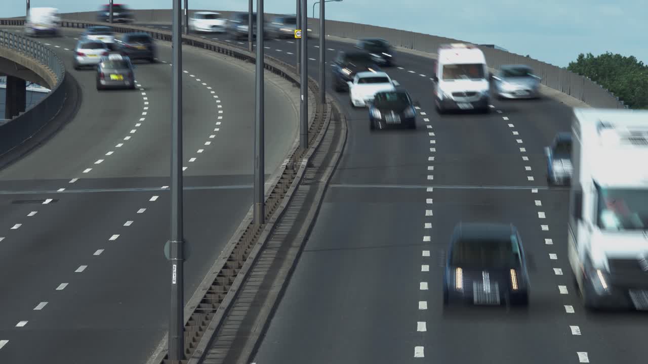 Motorway traffic on North London dual carriageway. Fast moving vehicular traffic on North Circular Road A406 in North London, UK. Timelapse