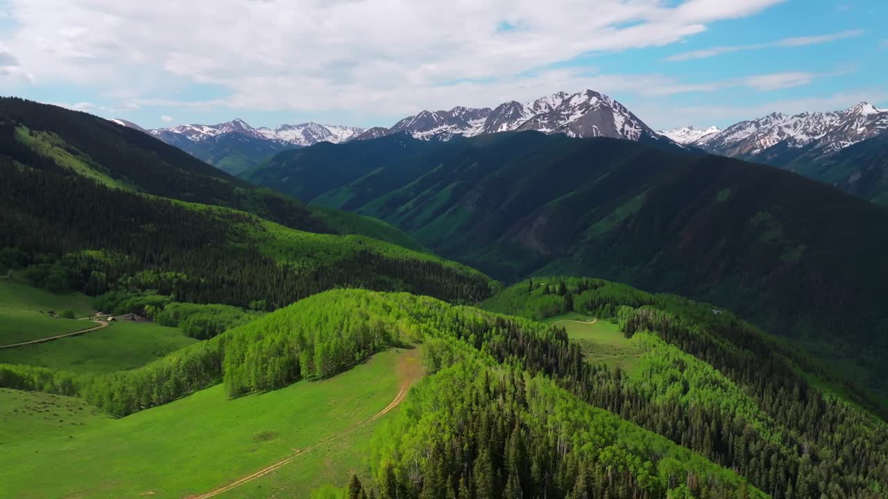 AJAX Aspen Mountain backcountry spring summer Rocky Mountain Conundrum Creek Castle Peak aerial drone Ashcroft Little Annie Trail Basin 4wd road morning blue sky cabins Aspen trees grove circle left
