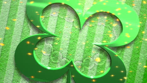 big irish shamrock with gold glitters on striped pattern