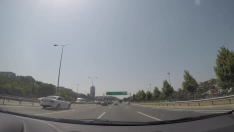 city, nature and traffic view from the camera inside the vehicle.