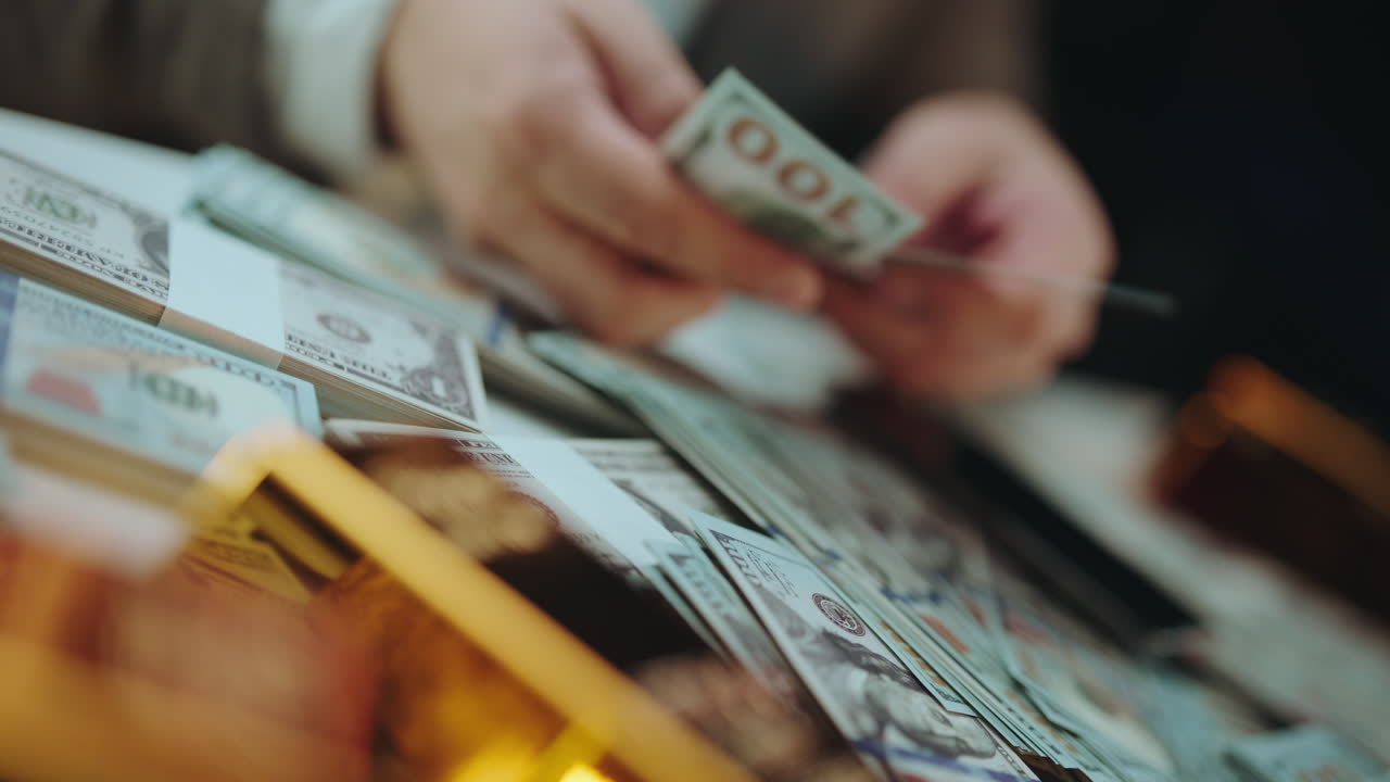 Stacks of Cash and Gold Bars