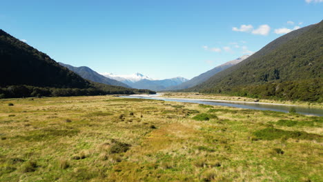 a flight close the the grass between the mountains in a valley close to the glacier at pleasant flat campsite