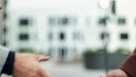 two men shaking hands in a business deal