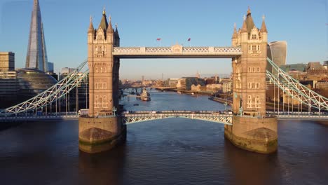 aerial front view of the tower bridge during golden sunrise