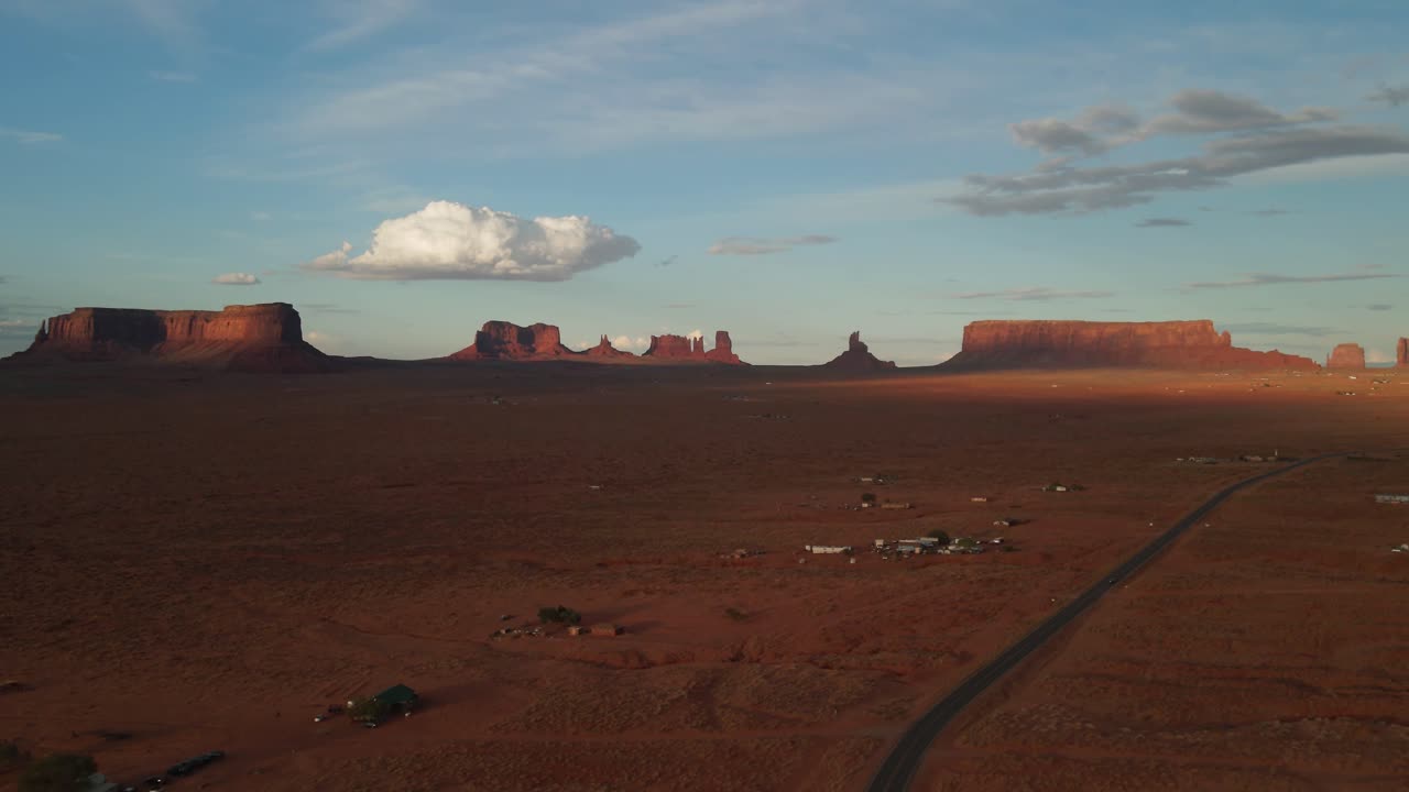 Fluffy Clouds Over Monument Valley