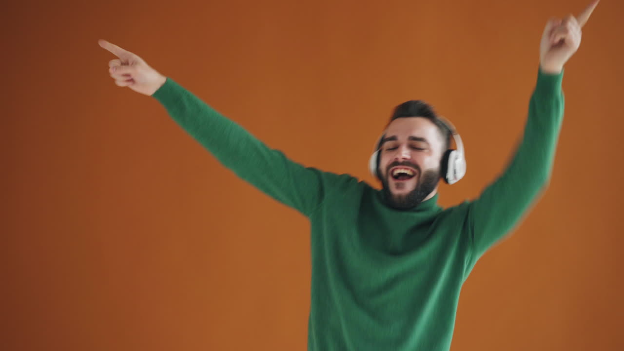 Man Dancing and Listening to Music