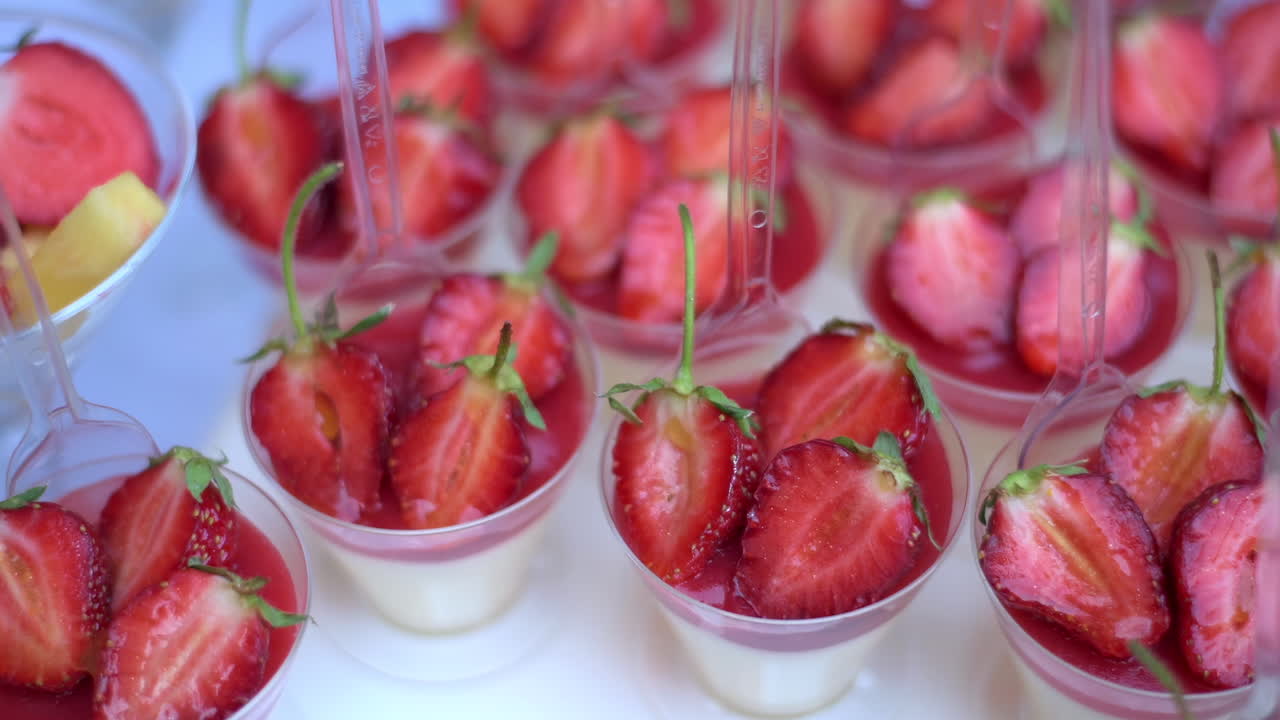Cinematic close-up shot of dessert table on an event. Candy bar idea