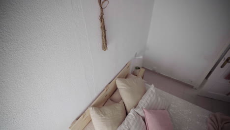 warm cushy cozy personal bedroom decked with pillows