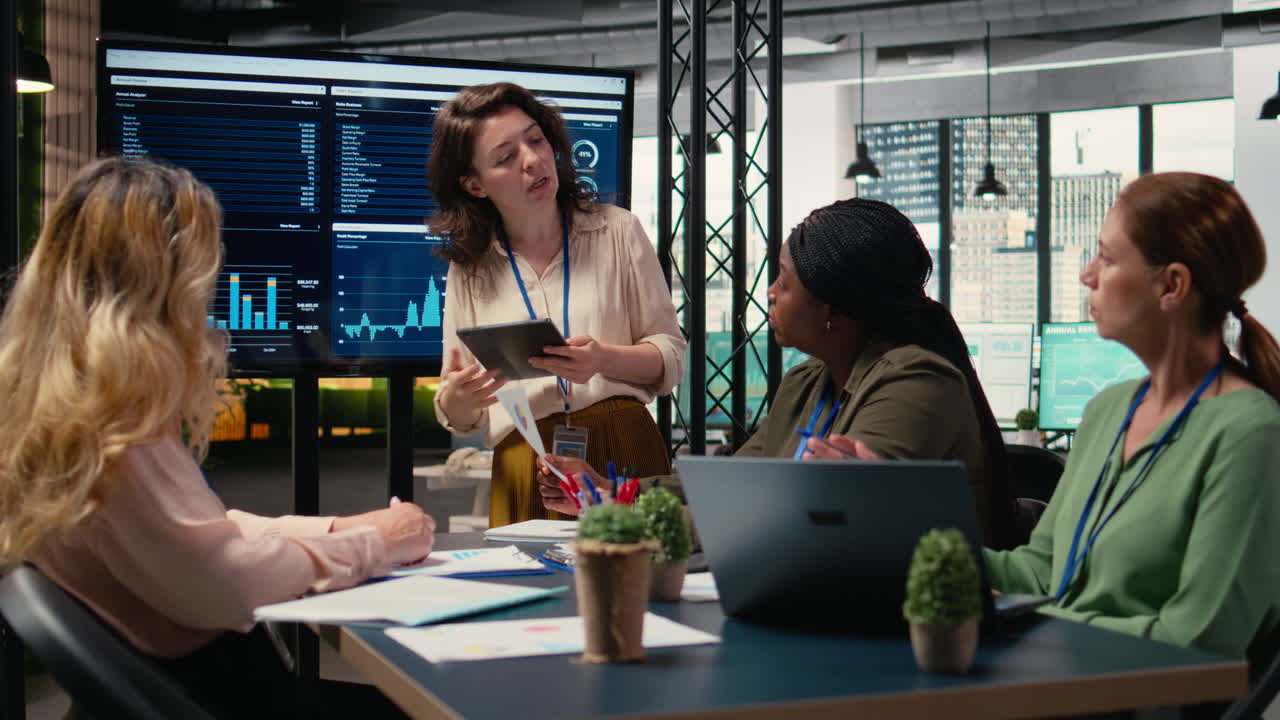 Vertical Video Businesswomen in a meeting symbolizing productivity in modern office