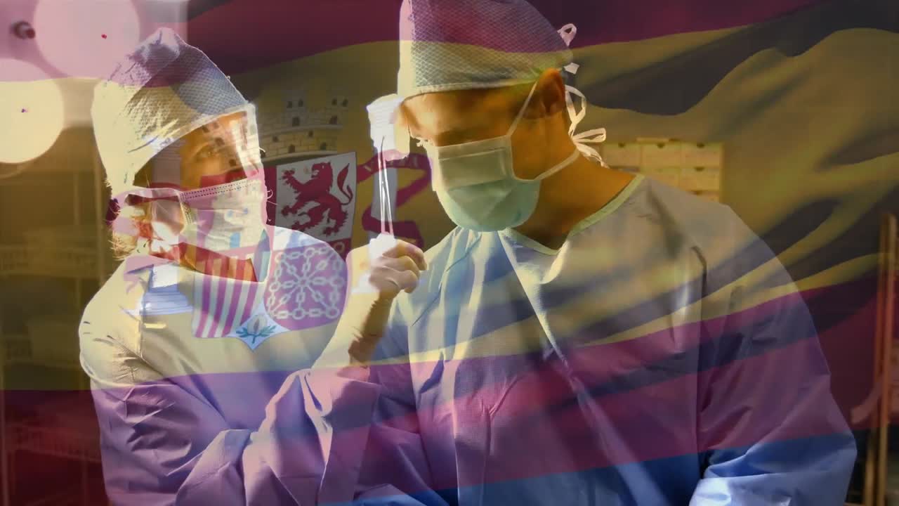 animación de la bandera de españa ondeando sobre los cirujanos en el quirófano