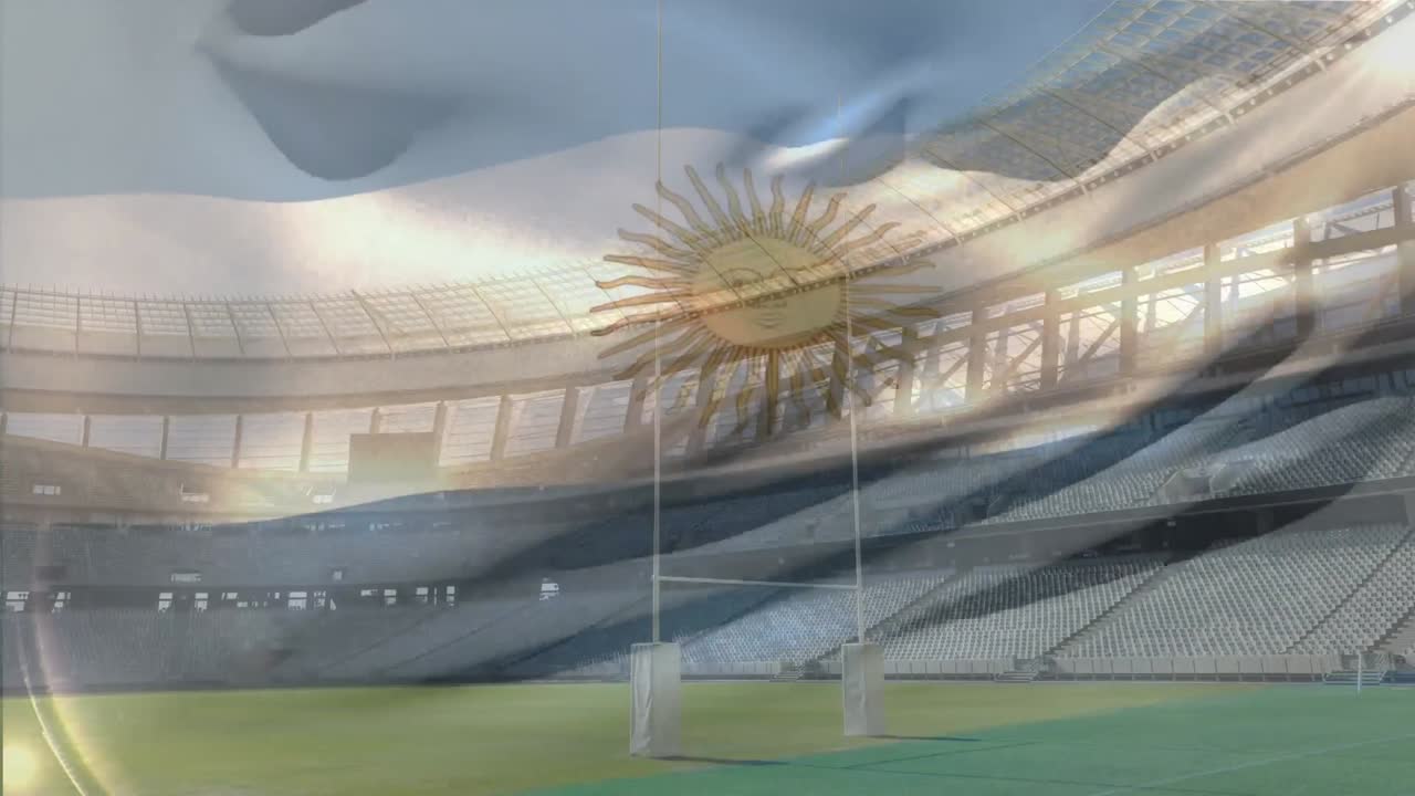 bandera ondeando frente a un estadio