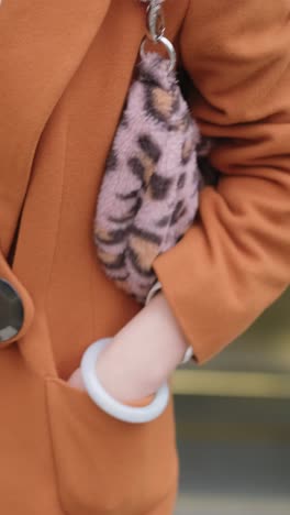 woman on the phone wearing a beret