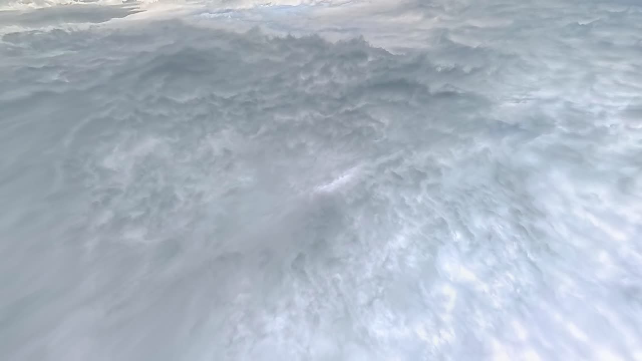 View Above Dramatic Clouds Moving On Blue Sky