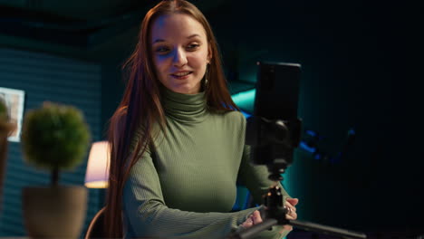 joyous teenager filming content for online streaming channel