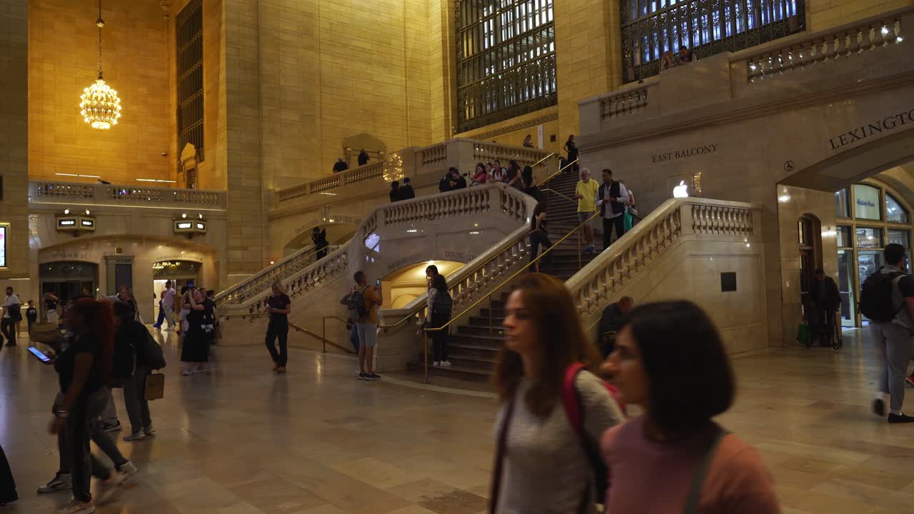 The famous marble staircases of Grand Central Terminal with people ascending and descending