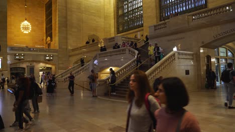 the famous marble staircases of grand central terminal with people ascending and descending