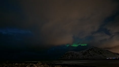 northern lights or aurora borealis over the sea in lofoten islands in norway