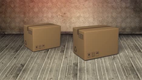 animación de dos cajas de cartón que caen en el suelo de madera
