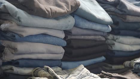 stack of folded jeans
