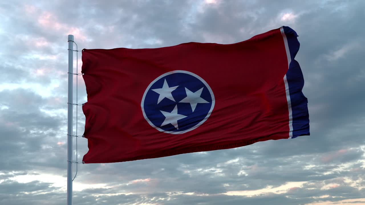 Realistic flag of Tennessee waving in the wind against deep Dramatic Sky. 4K UHD 60 FPS Slow-Motion