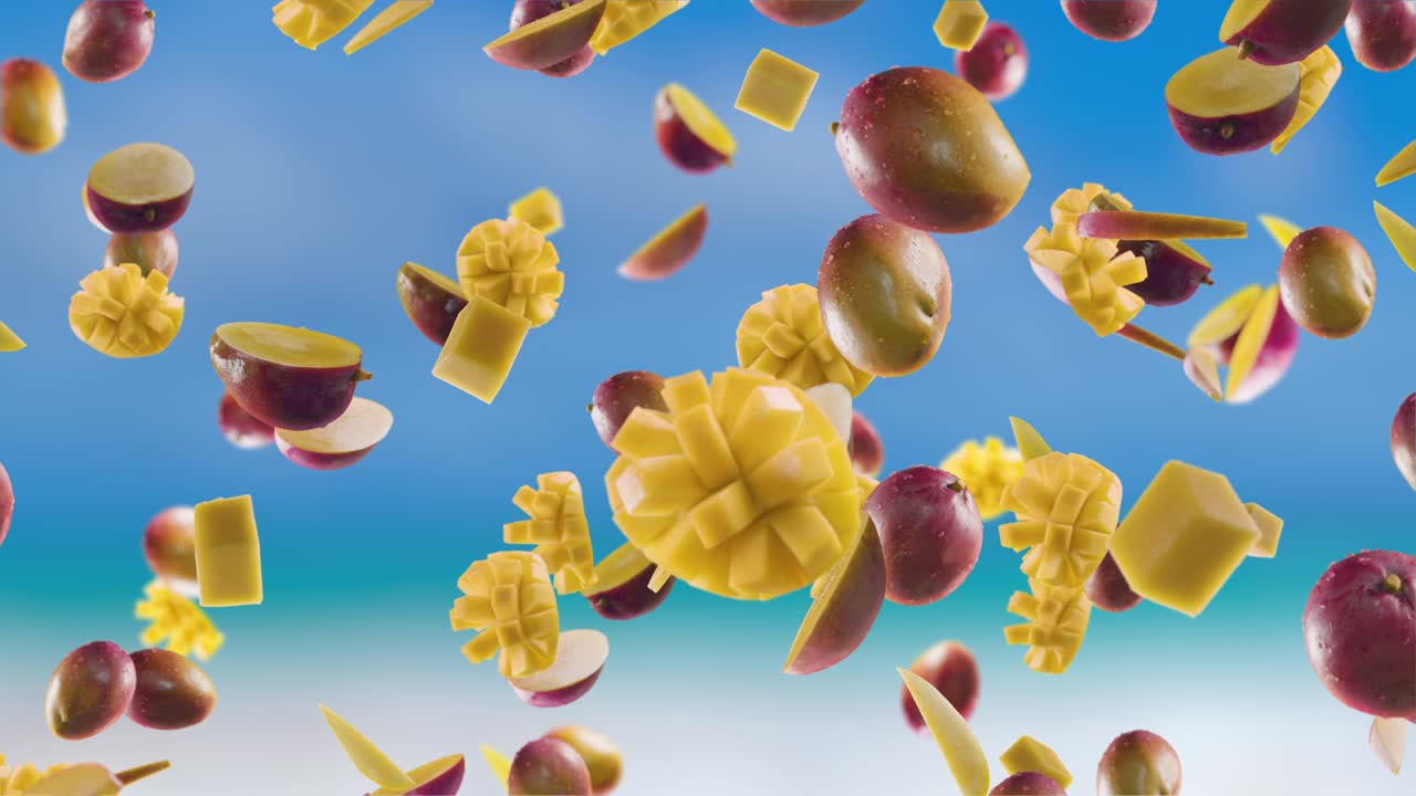 파란색 해변 배경에 떨어지는 망고 조각.