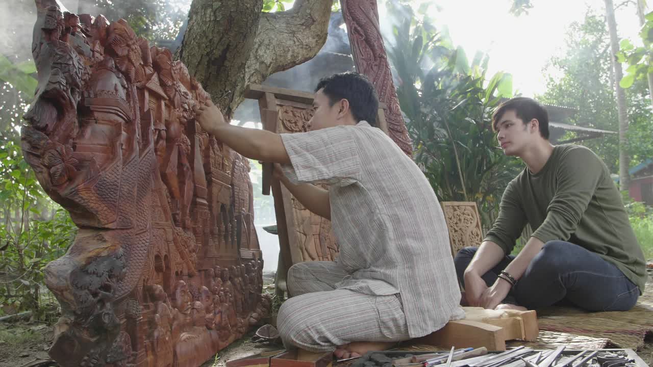 Young Man Looking Carpenter Carving Wooden, Slow Motion