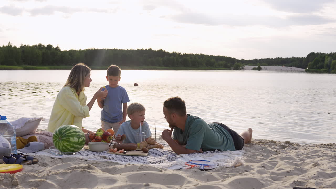 Family having picnic on the beach