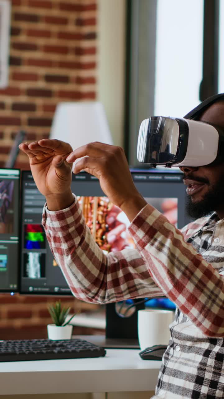 Vertical Video African american editor uses virtual reality glasses to do color grading