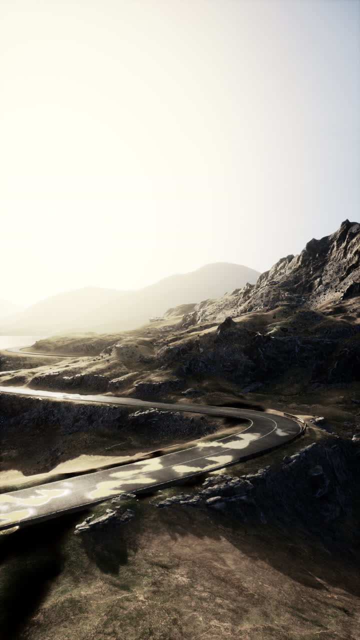 un camino sinuoso que conduce a través de un paso de montaña