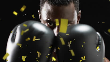 animación de confeti cayendo sobre un boxeador afroamericano en fondo negro